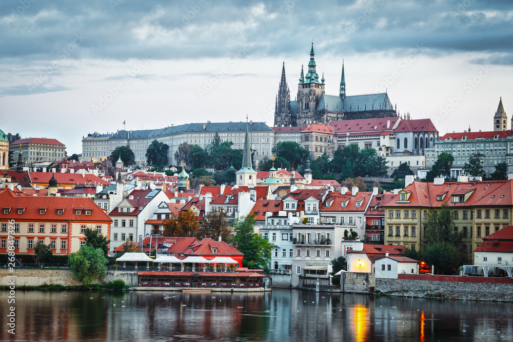 Fototapeta premium Evening in Prague. View of Prague Castle and the Vltava River Embankment. Czech Republic.