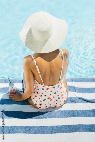 Brunette girl in a swimsuit