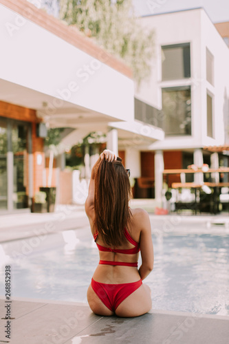 Attractive young woman in r...