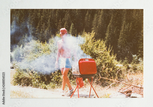 Man in the seventies doing a barbecue