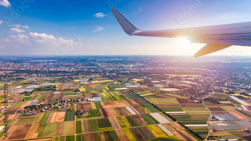 фотографія Airplane windows view above the earth on landmark down