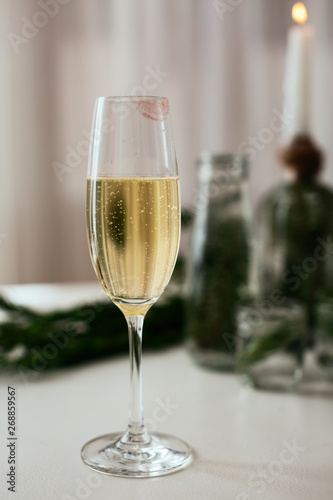 Champagne glass on dining table.