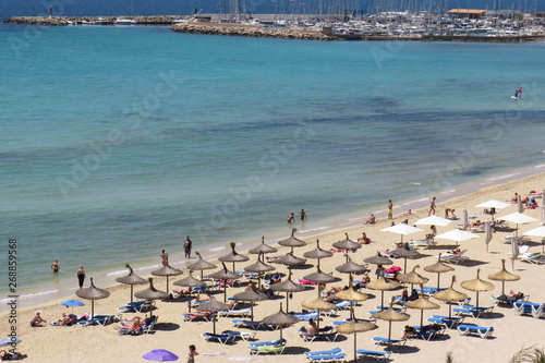 tourist on the beach of can pastilla majorca spain may 2019