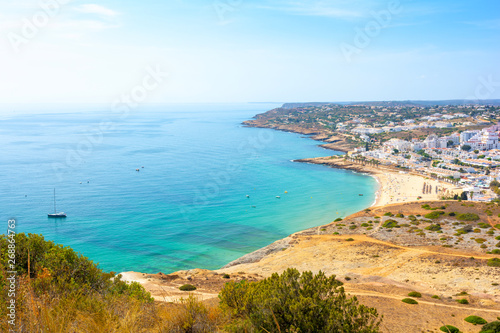 view on Praia da Luz in sunny day with turquoise Atlantic ocean, Algarve, Portugal