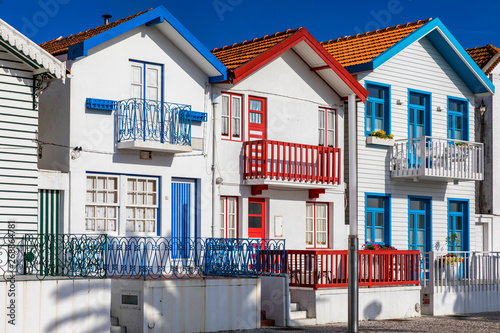 Street with colorful houses in Costa Nova, Aveiro, Portugal. Street with striped houses, Costa Nova, Aveiro, Portugal. Facades of colorful houses in Costa Nova, Aveiro, Portugal.