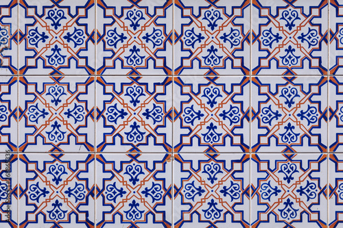 Azulejo is a form of Portuguese or Spanish painted, tin-glazed, ceramic tile work. Azulejos is traditional Portugese tiles in Aveiro. Architecture ornament. Aveiro, Portugal.