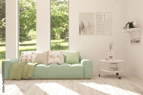 Stylish room in white color with sofa and summer landscape in window. Scandinavian interior design. 3D illustration