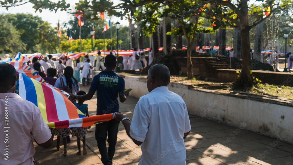 A group of devoted pilgrims having a pooja ceremony in Anuradhapura in Sri Lanka