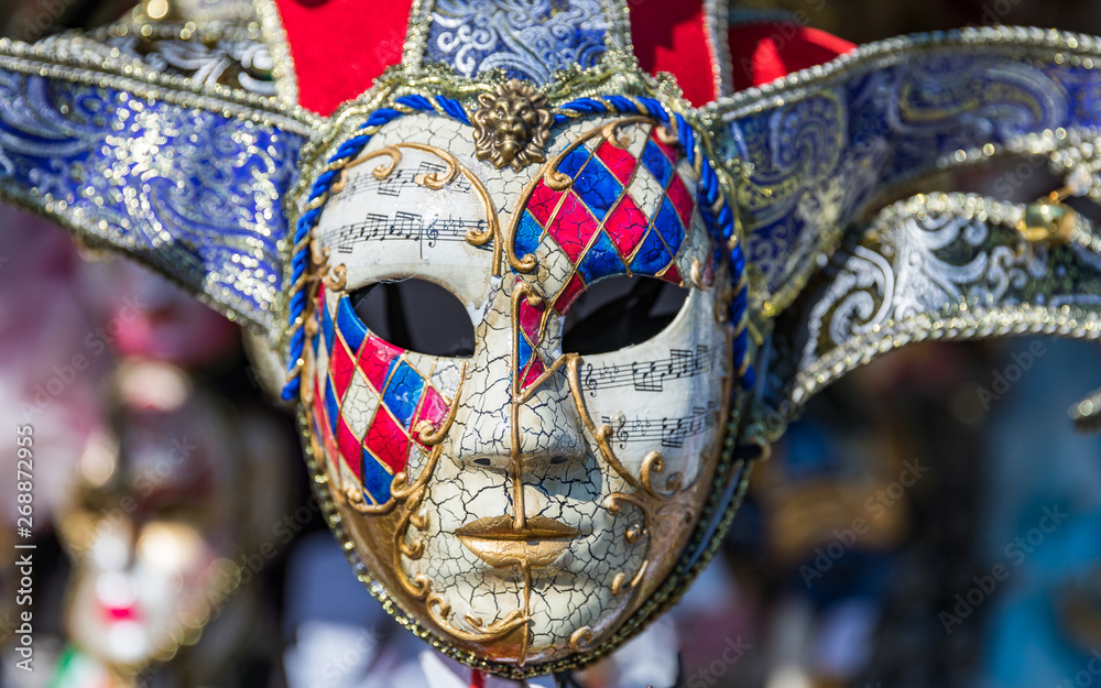 Group of Vintage venetian carnival masks. Venetian masks in store display  in Venice. Annual carnival in