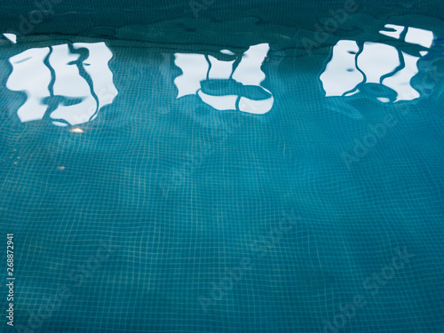 Window light on the surface of an indoor pool. UK photo