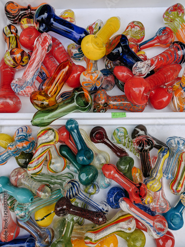 Lots of colorful glass pipes photo