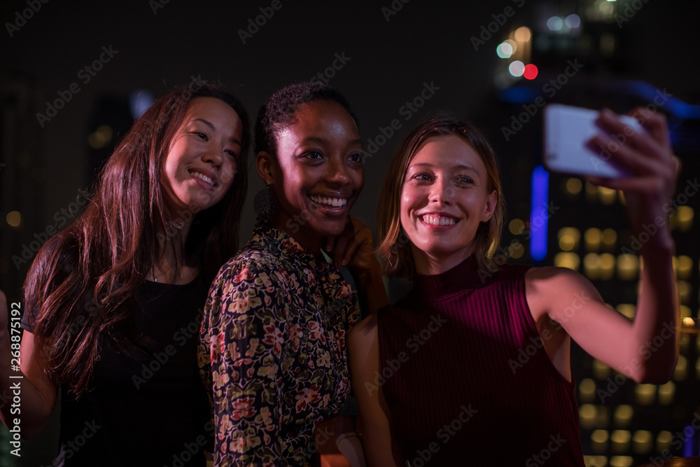 Girlfriends having fun and taking a selfie Girlfriends having fun and taking a selfie