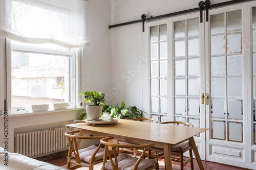 View of a simple bright dinning room photo