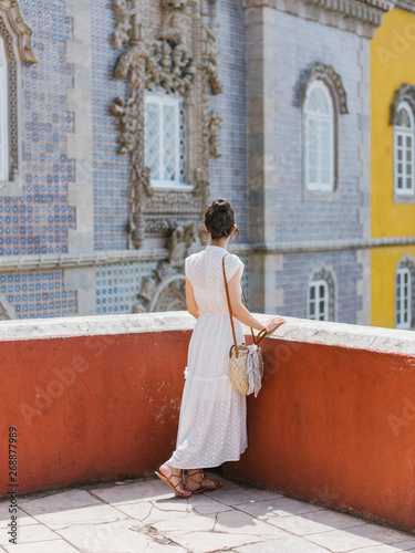 Woman at palace balcony photo