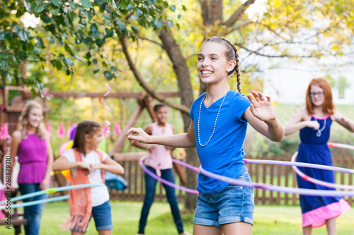 Birthday: Smiling Girl Winning At Hula Hoop Contest