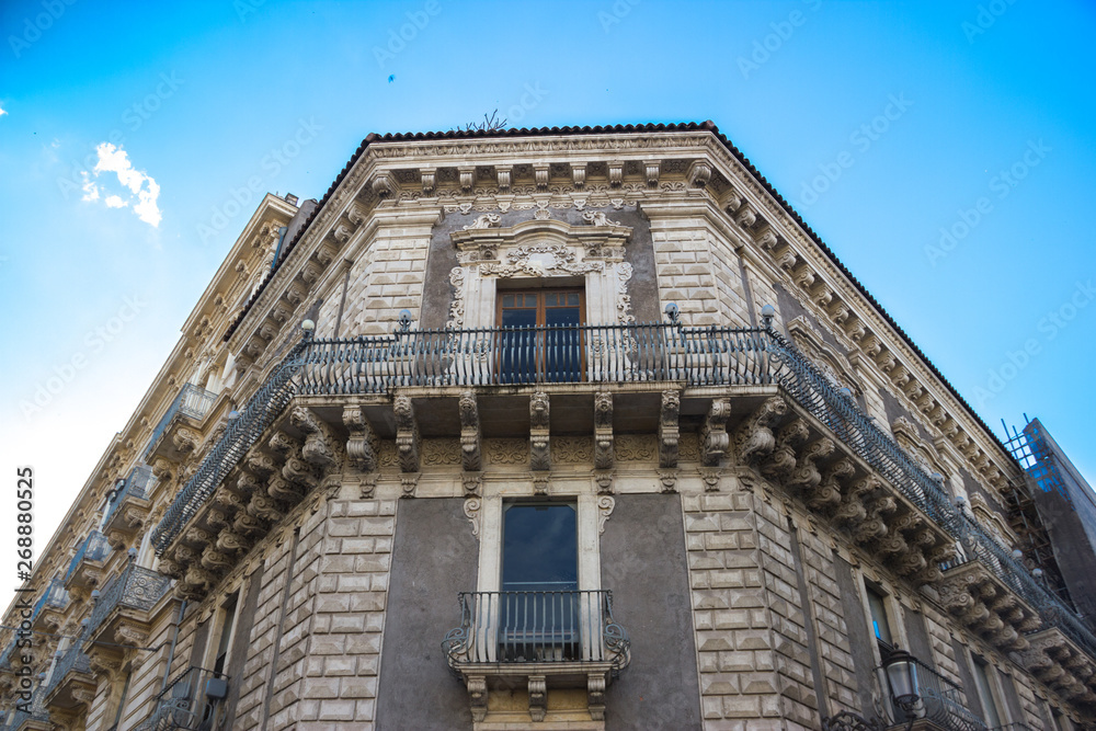Catania historical baroque ornament in facade, balcony and windows