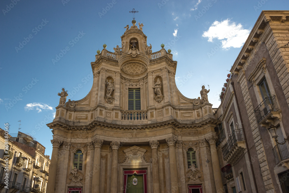 Catania baroque Collegiata basilica, architecture of facade and side building
