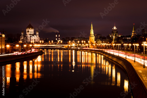 View onto illuminated Moscow Kremlin with tower and Cathedral of Christ the Saviour during a dark winter evening with Moskva river (Moscow, Russia, Europe) © Yannik Photography