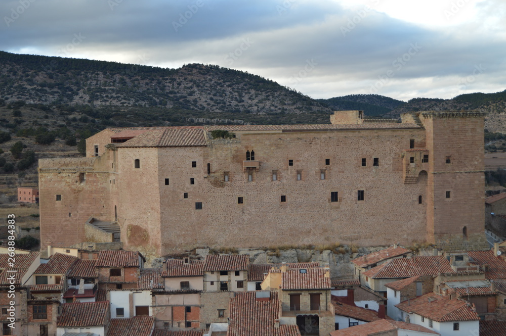 December 27, 2013. Mora De Rubielos. Teruel, Aragon, Spain. Beautiful View Of The Castle Of The XII Century On A Very Cloudy Day. History, Travel, Nature, Landscape, Vacation, Architecture.