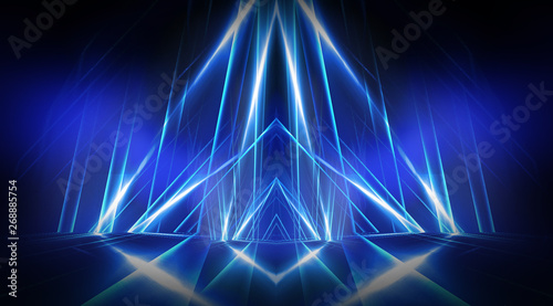 Empty stage, blue neon, abstract blue background. Rays of searchlights, light, abstract tunnel, corridor.