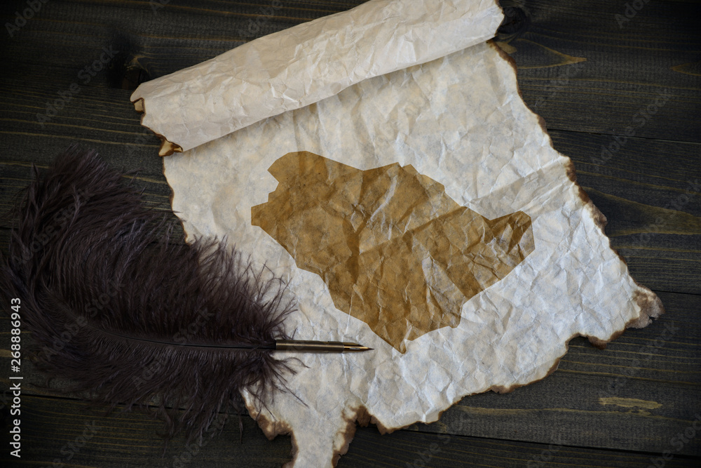 map of saudi arabia on vintage paper with old pen on the wooden texture ...