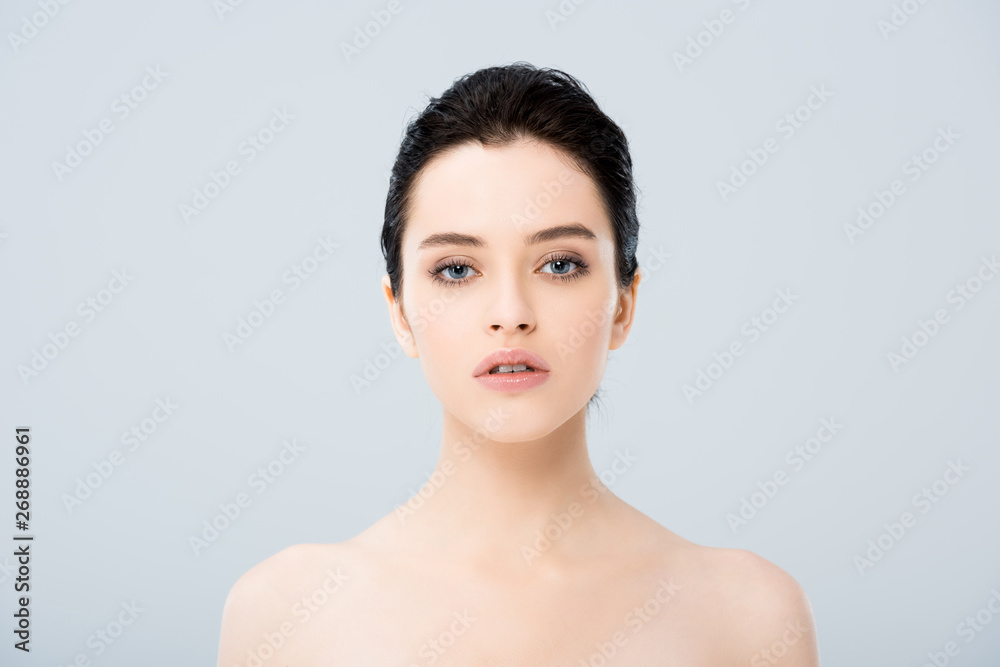 beautiful nude young woman looking at camera isolated on grey beautiful nude young woman looking at camera isolated on grey