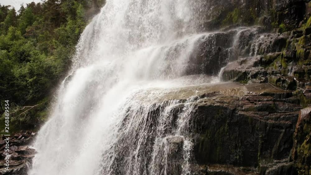 Svandalsfossen in Norway, waterfall in norwegian mountains. National tourist Ryfylke route Svandalsfossen in Norway, waterfall in norwegian mountains. National tourist Ryfylke route