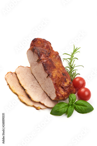 Sliced baked pork roast, Christmas fried spicy galzed meat, close-up, isolated on white background.