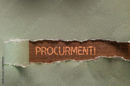 Word writing text Procurment. Business photo showcasing action of acquiring military equipment and supplies Long hole sheet blank paper wrapped paper tear. Wooden table background photo