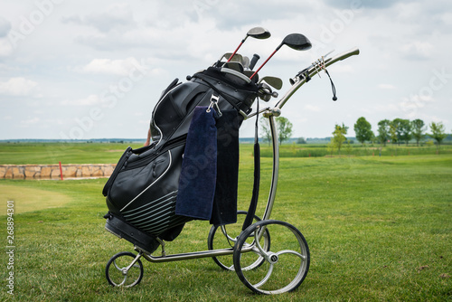 big modern bag with golf clubs