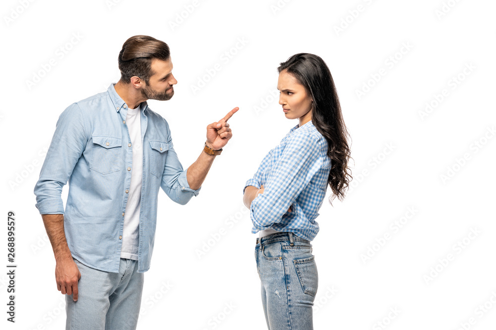 angry man pointing with finger at young woman Isolated On White angry man pointing with finger at young woman Isolated On White
