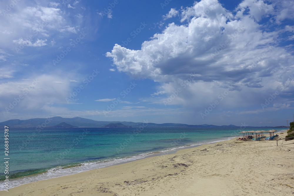 Photo from famous beach of Agia Anna with turquoise clear sea, Naxos island, Cyclades, Greece