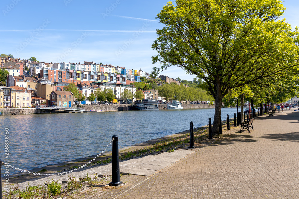 BRISTOL, UK - MAY 14 : View of boats and colourful apartments along the River Avon in Bristol on May 14, 2019. Unidentified people