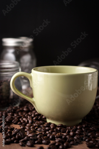 image of coffee cup on wood background © Sataporn