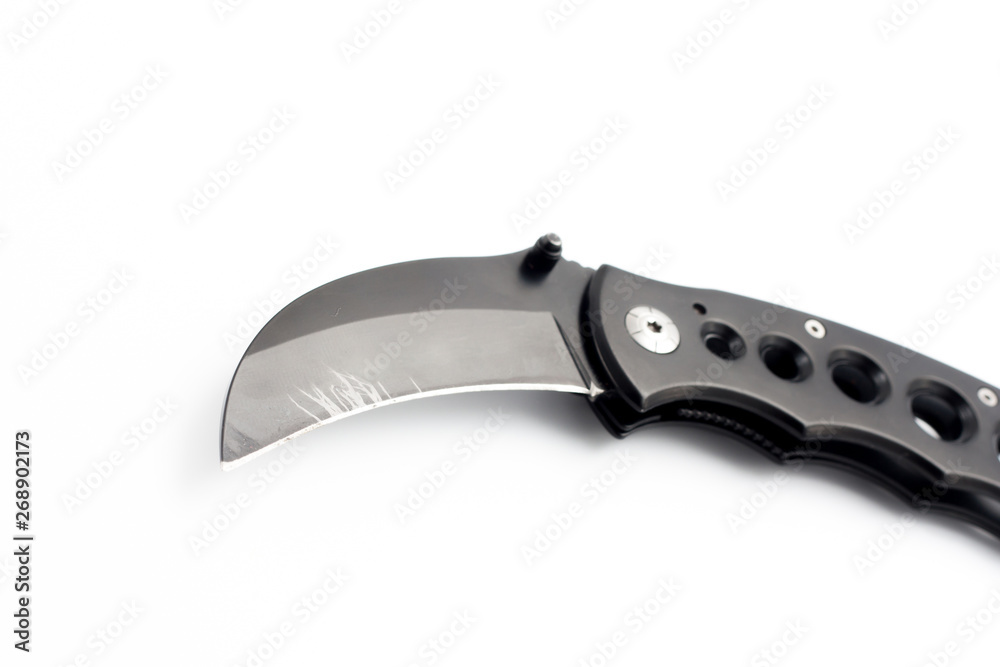 Black pocket combat knife on isolate white background