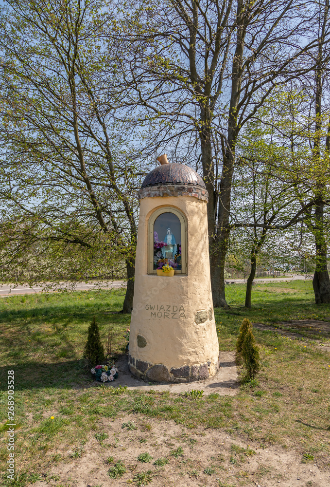 Wayside shrine with holy Mary inside at Sobieszewo island in Poland