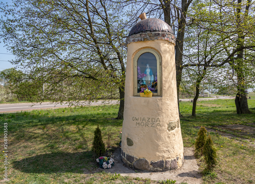 Wayside shrine with holy Mary inside at Sobieszewo island in Poland