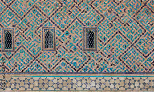 ancient wall of a mosque of mosaic tiles