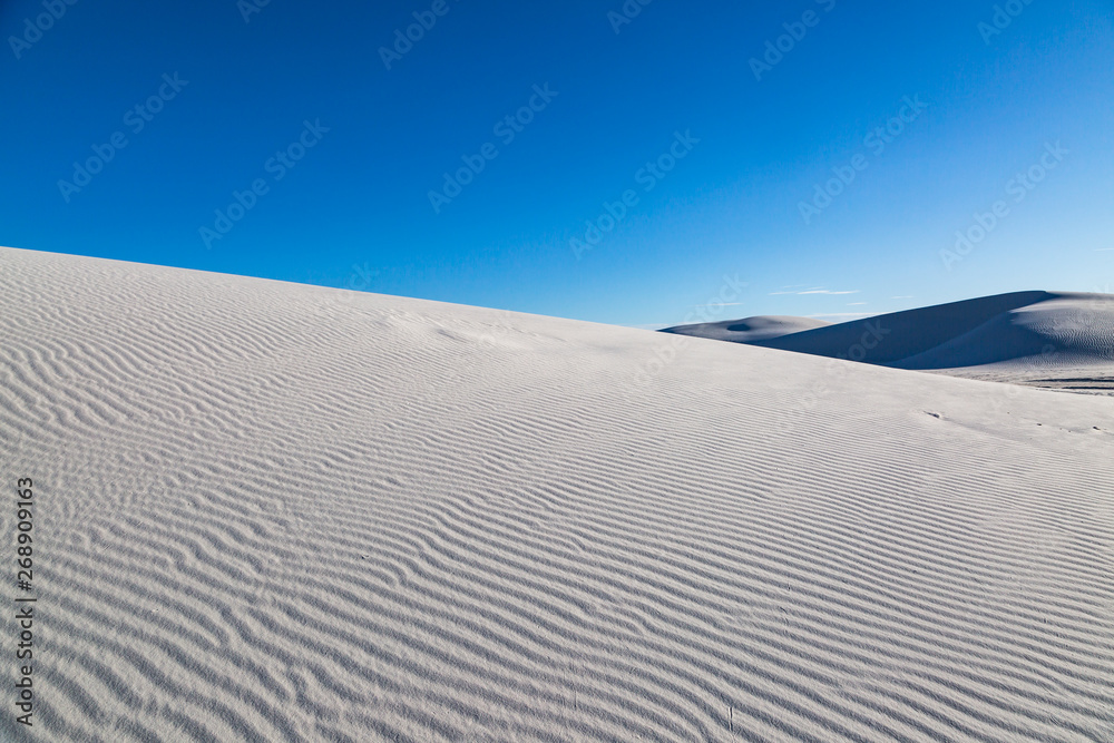 Light and shadow on the gypsum sand dunes, at White Sands National Monument, New Mexico
