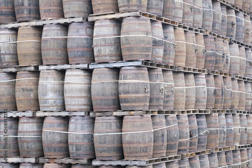 Wooden oak barrel stack for whisky distillery Wooden oak barrel stack for whisky distillery