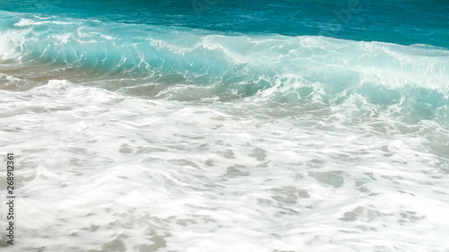 Beautiful image of rolling sea waves. Turquoise ocean sea tides
