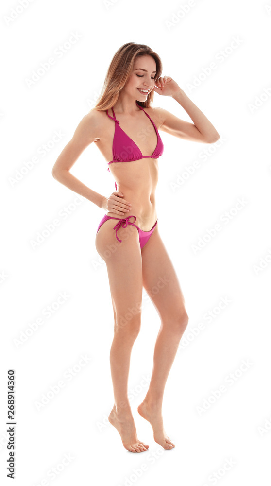 Young slim woman in bikini on white background. Perfect body Young slim woman in bikini on white background. Perfect body