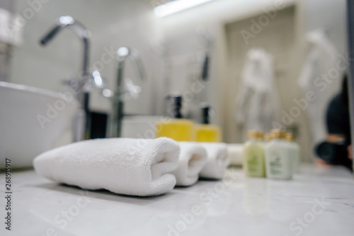 Close up of natural soap and bath towels