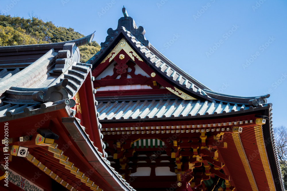 Details of a Japanese temple facade. Asian culture and architecture Details of a Japanese temple facade. Asian culture and architecture