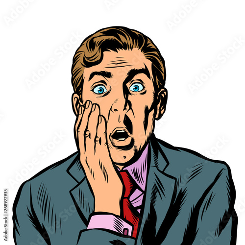 the surprised man covered his face with his hand