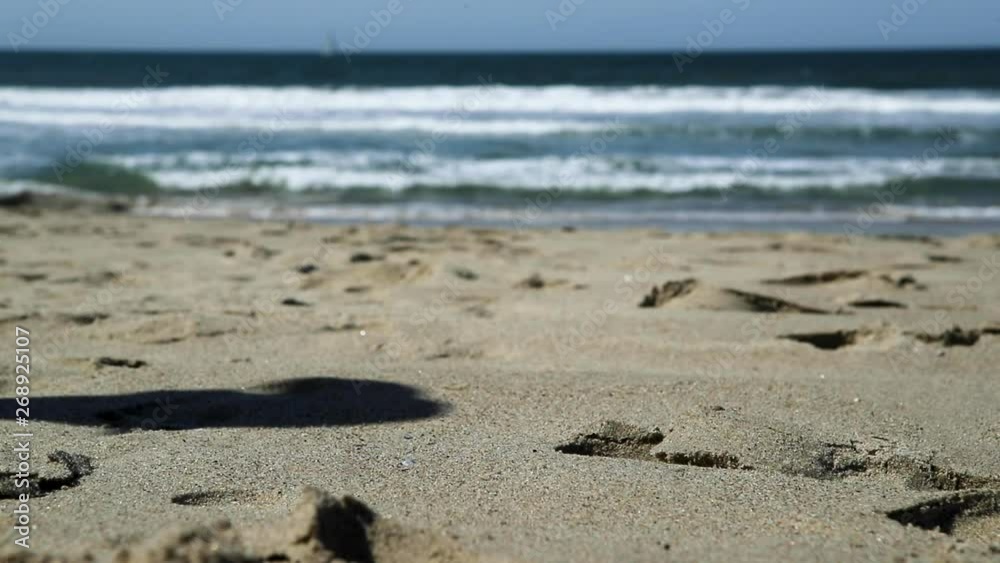 Ocean Waves With Feet Walking Along Beach Ocean Waves With Feet Walking Along Beach