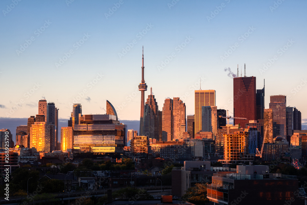 Toronto city center skyline during early morning golden hour sunrise