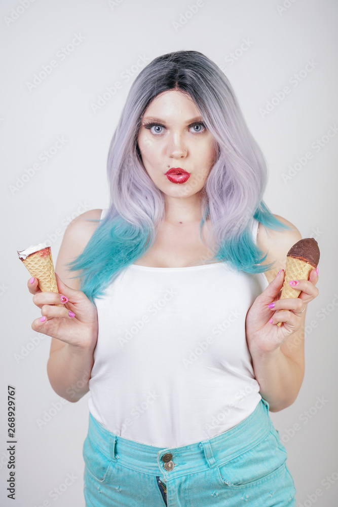 pretty caucasian blonde short hair girl eating tasty ice-cream with waffle cone and chocolate on white studio background pretty caucasian blonde short hair girl eating tasty ice-cream with waffle cone and chocolate on white studio background