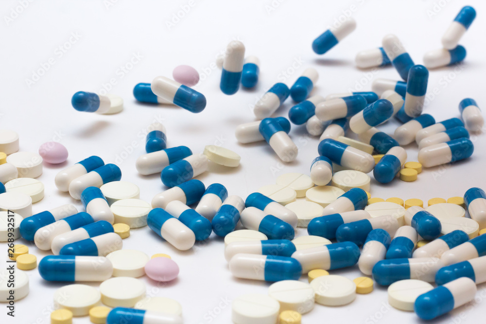 different pills on white different pills on white