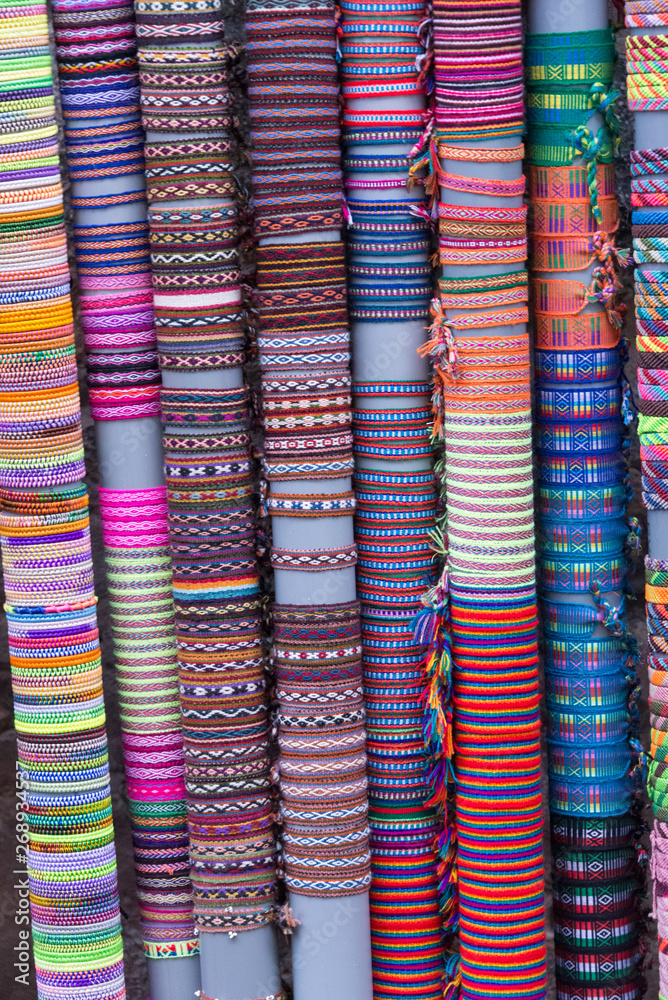 Rows of colorful hair tiaras, handmade by Peruvian artisans, Cusco, Peru